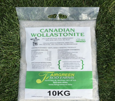 A bag of canadian wollastonite is sitting in the grass.