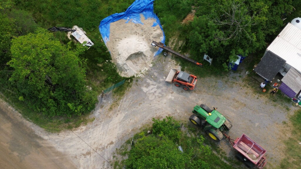 Aerial view of construction site with machinery.